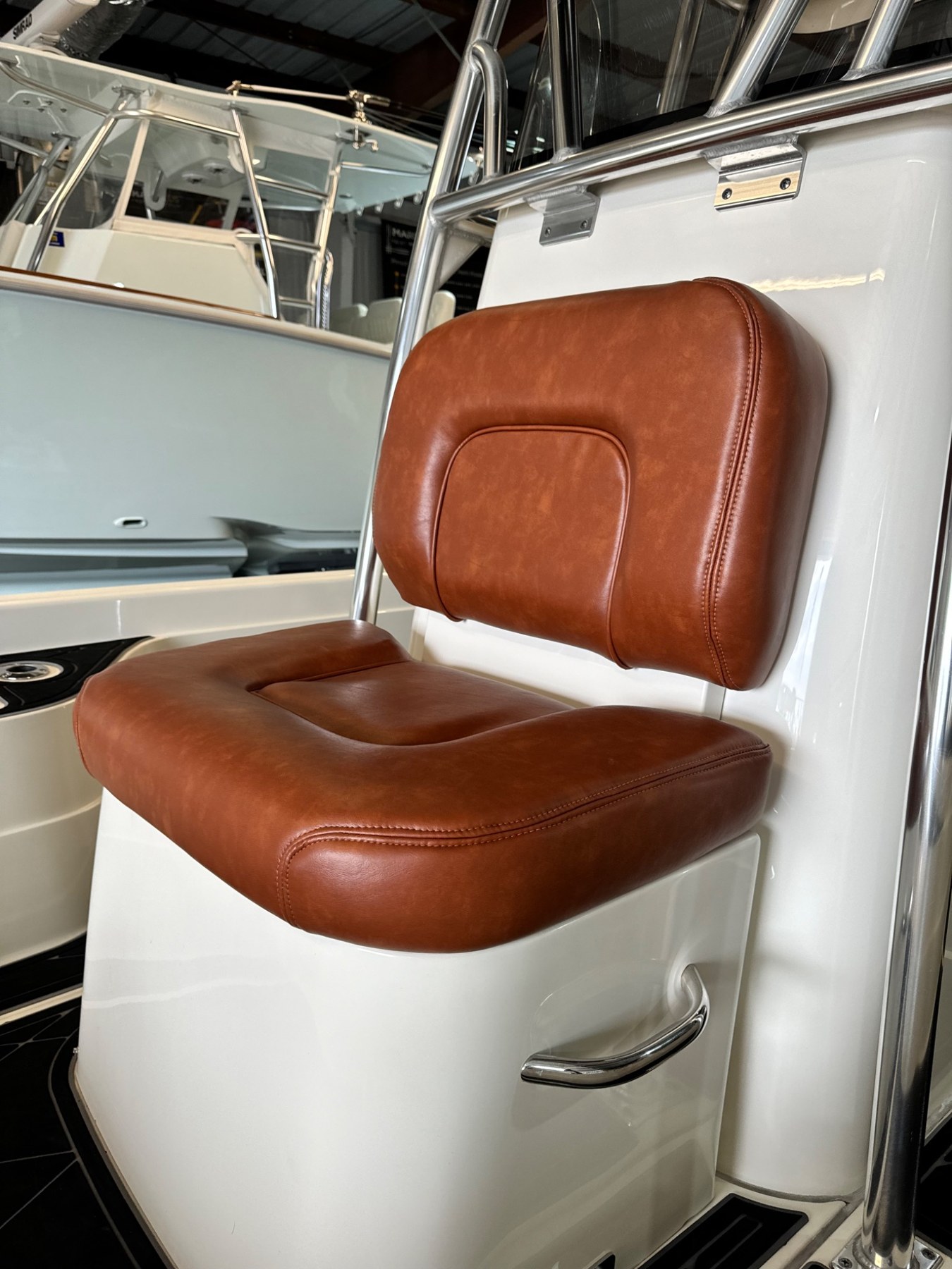 Brown upholstered helm seat