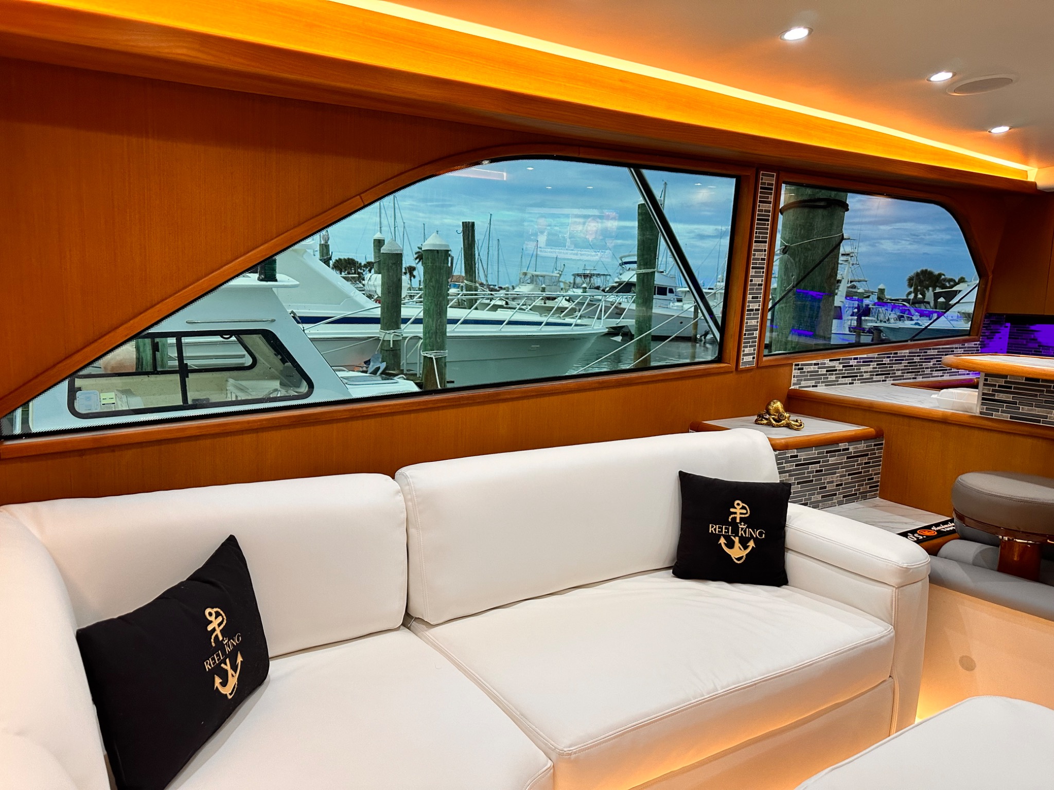 Tinted yacht cabin windows overlooking the marina
