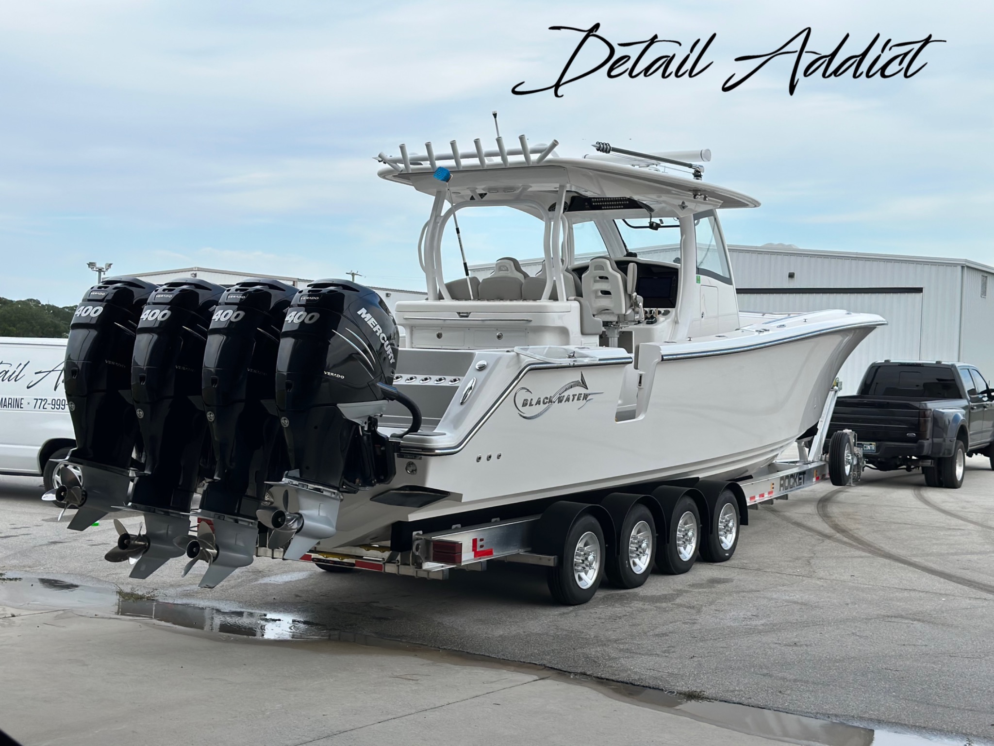 Blackwater boat with four Mercury outboards at Detail Addict