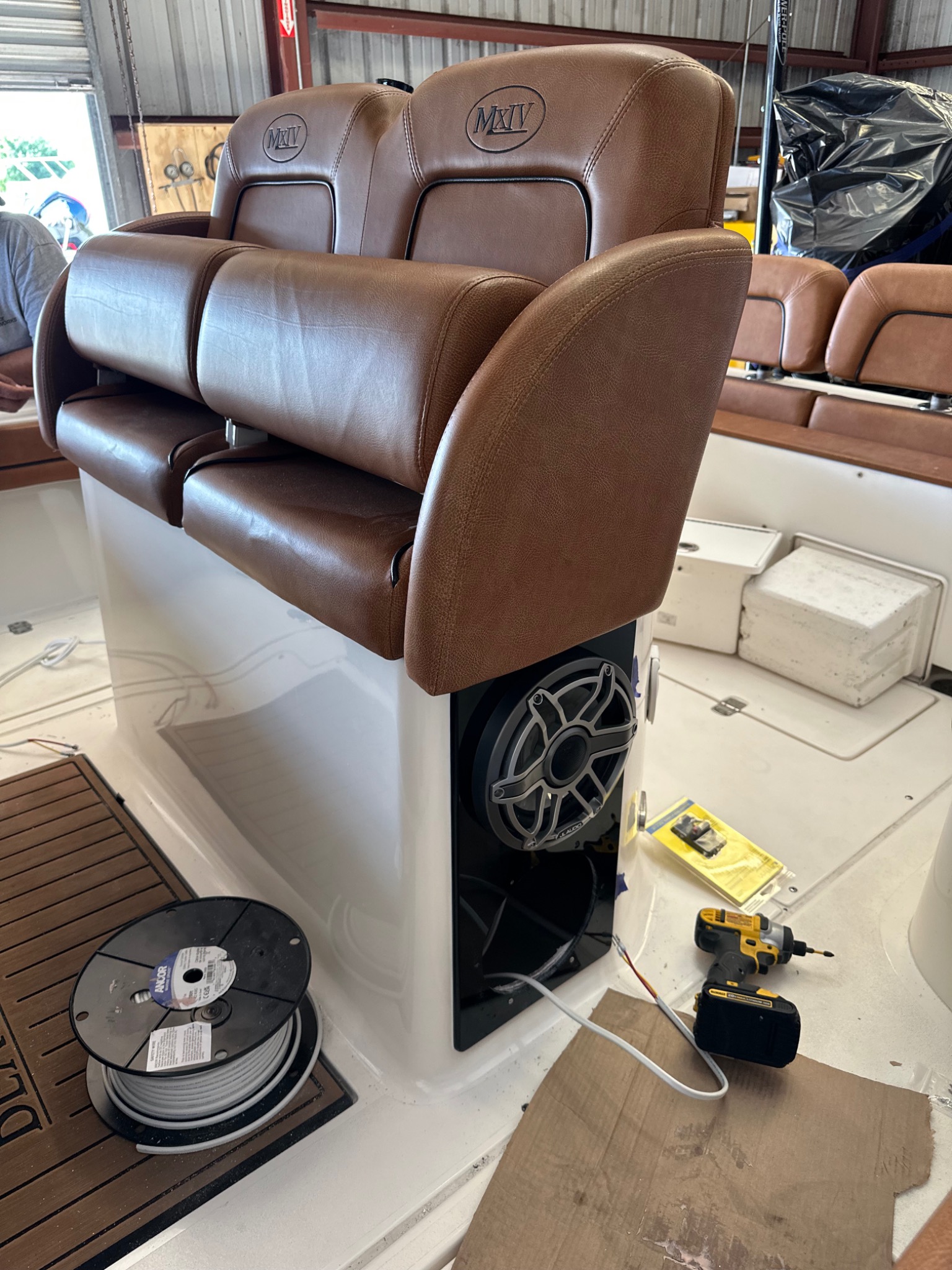 Brown custom marine helm seating and speaker installation