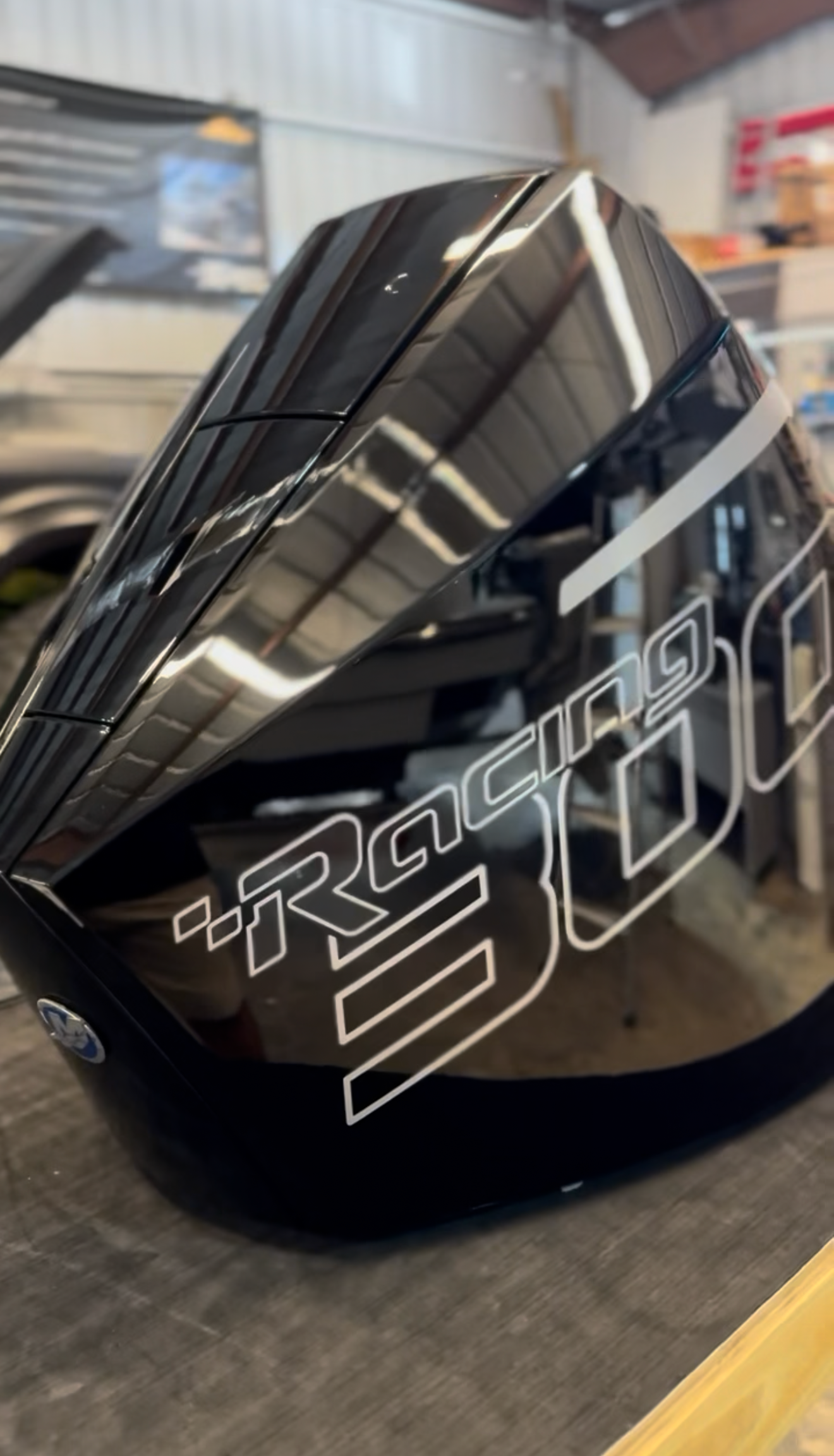 Custom-painted black outboard cowlings with Mercury and 300 details