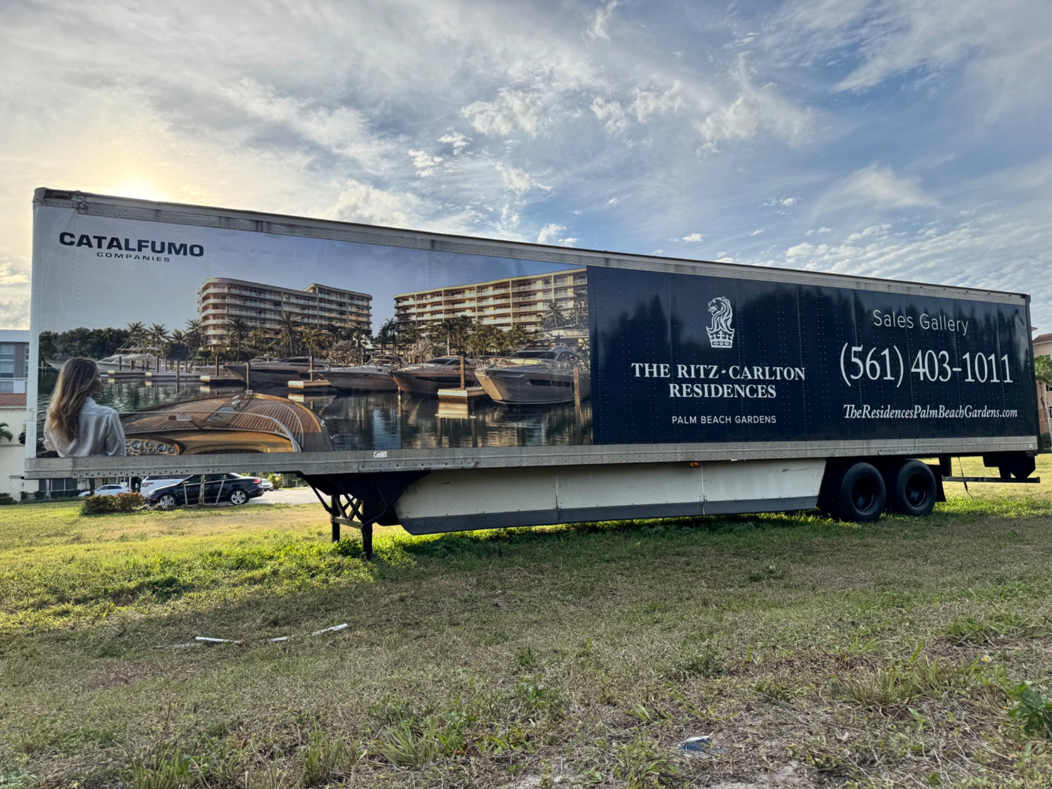 Commercial trailer wrapped with Ritz-Carlton Residences branding