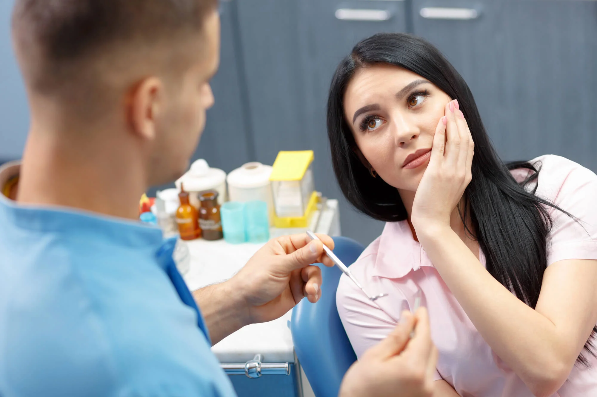 Jaw pain before dental extraction in San Antonio