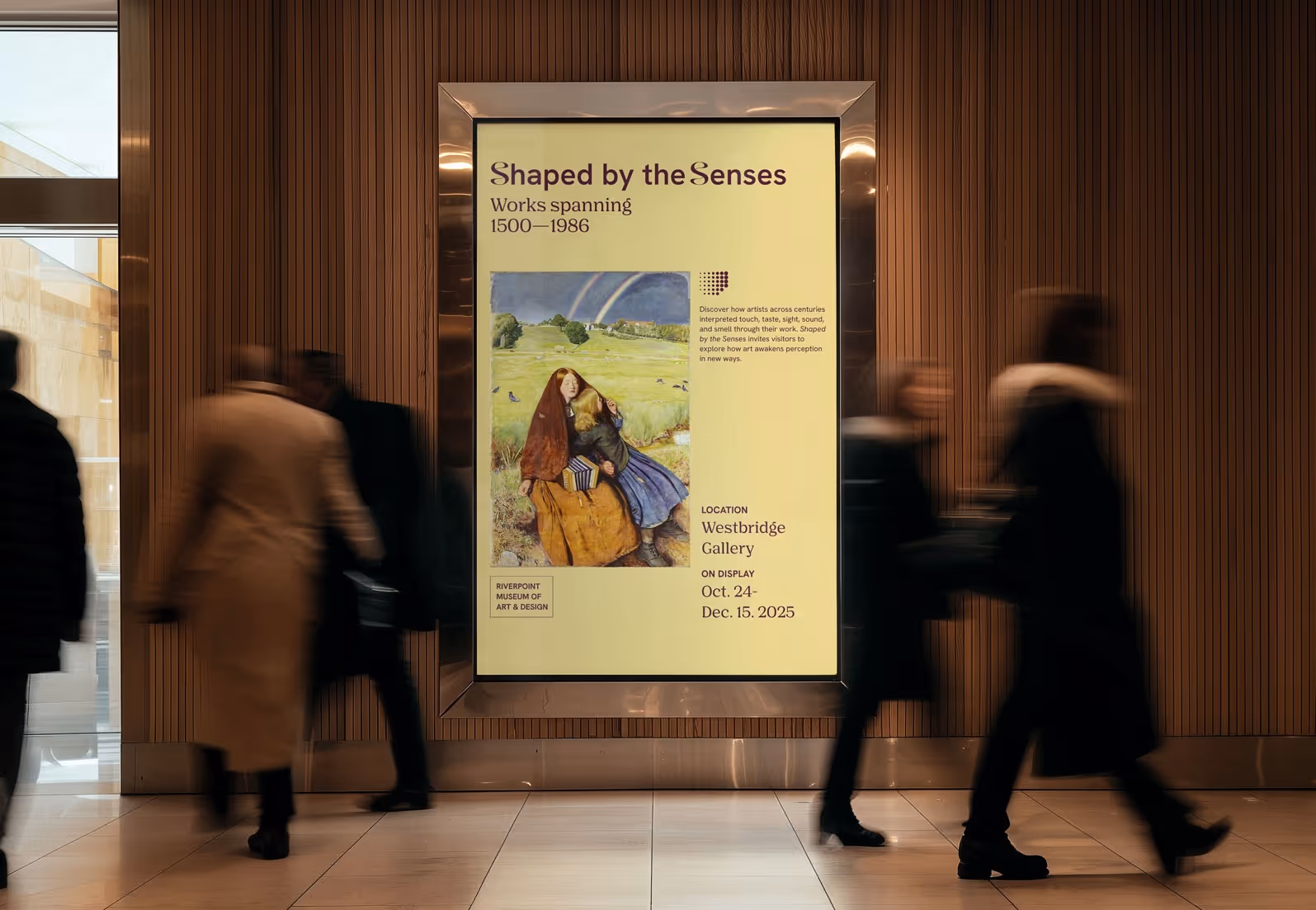 Museum hallway with blurred people walking past an illuminated exhibit poster titled 'Shaped by the Senses' showing a painting and exhibit details.