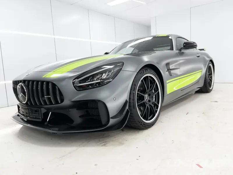 Unique Tints - Mercedes AMG wrapped with Stripes