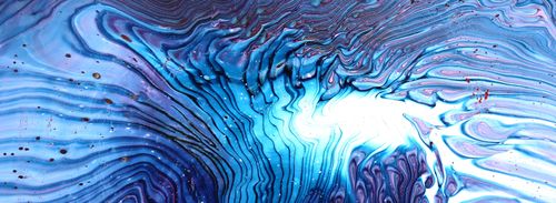 Acrylic art depiction of a purple galaxy