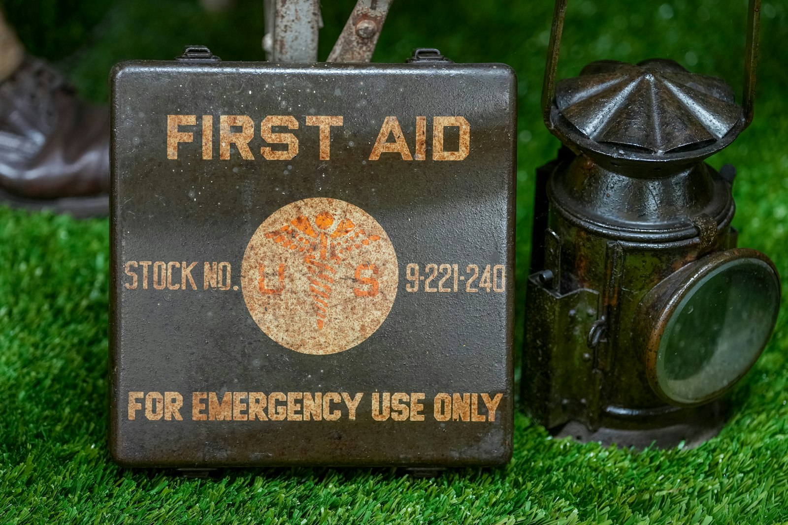 A first aid kit and lantern, prepared and ready
