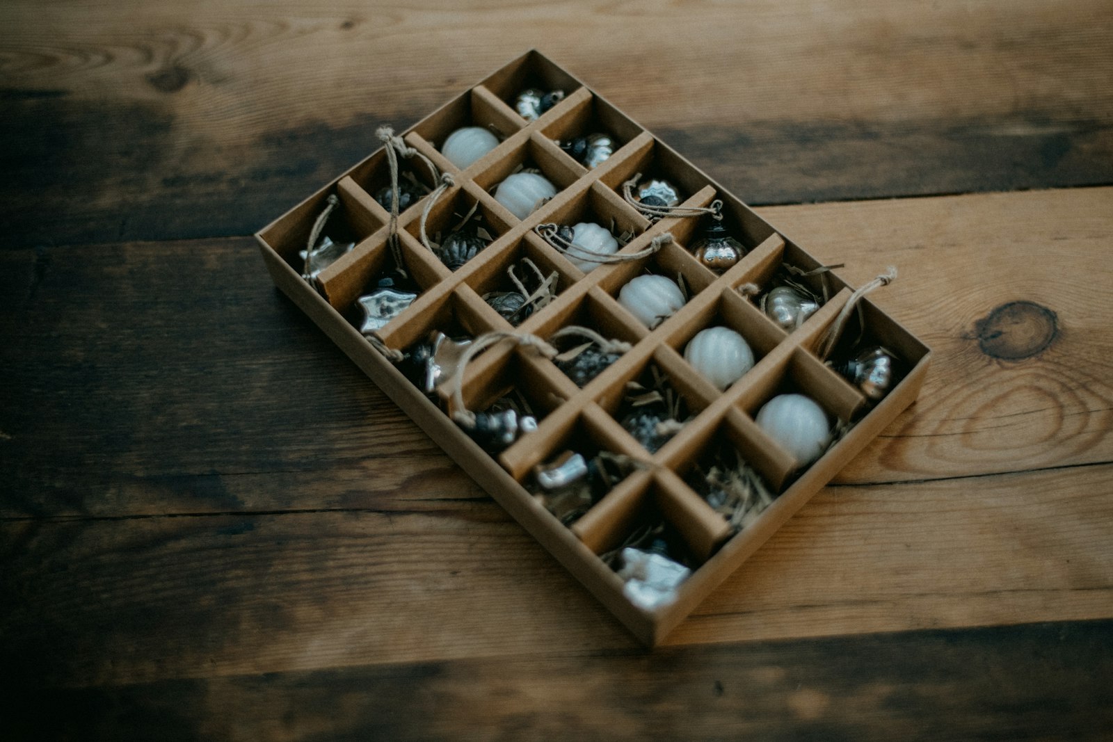 Box of holiday ornaments ready to be sorted and edited