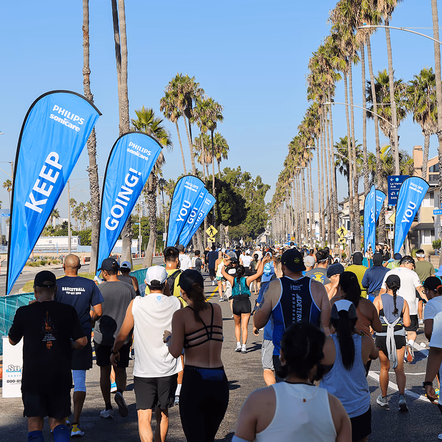 People running through a street in a marathon