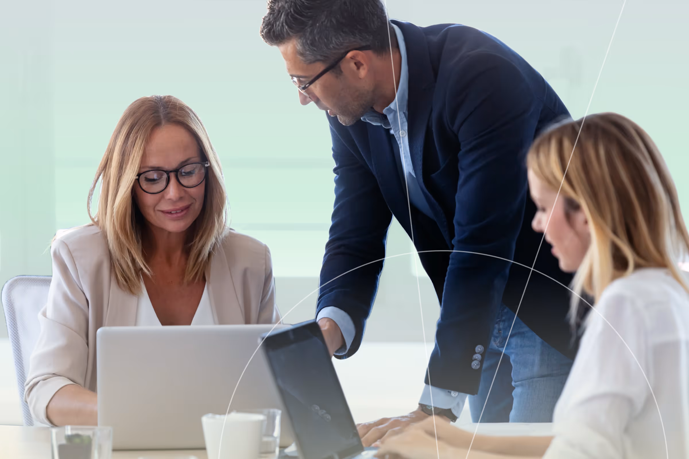 A group of business women and men