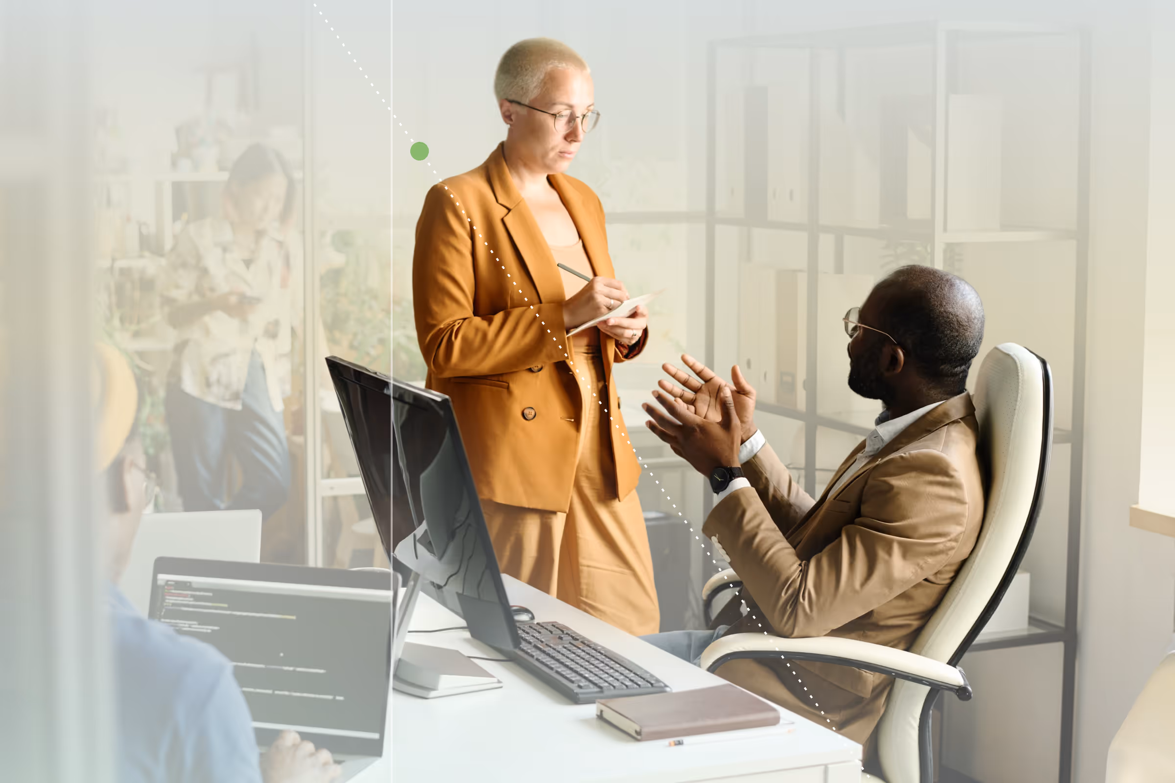 A business woman and a business man discussing work.