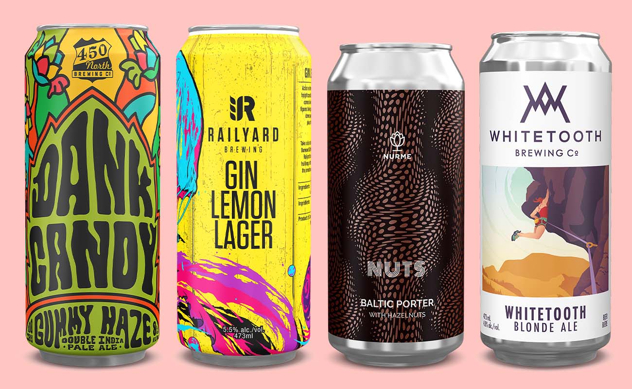 Four craft beer cans from 450 North, Railyard, Nurme, and Whitetooth Brewing, product shots showing diverse label art on pink background