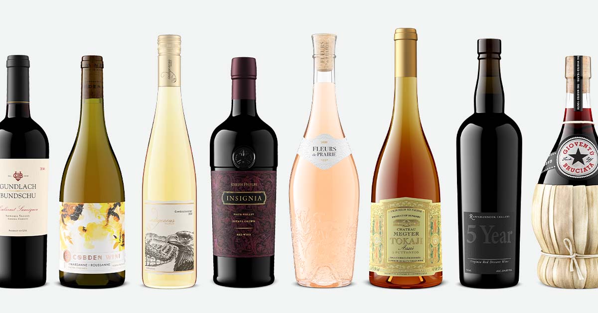 Glass wine bottles in different colors for wine product photography