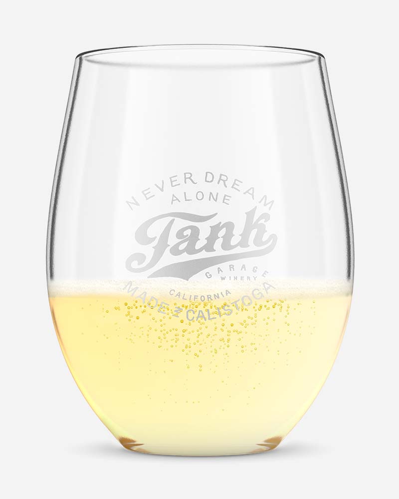 sparkling wine in a tumbler with a winery logo
