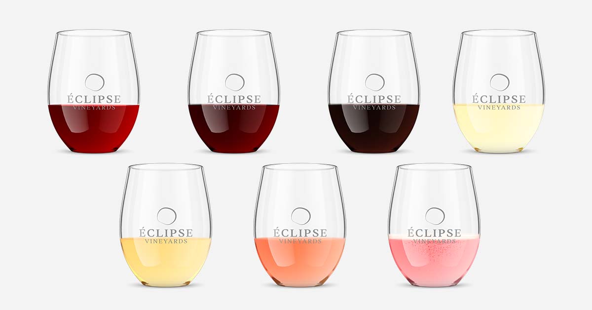 multiple wine tumblers featuring a winery logo and various wine liquids