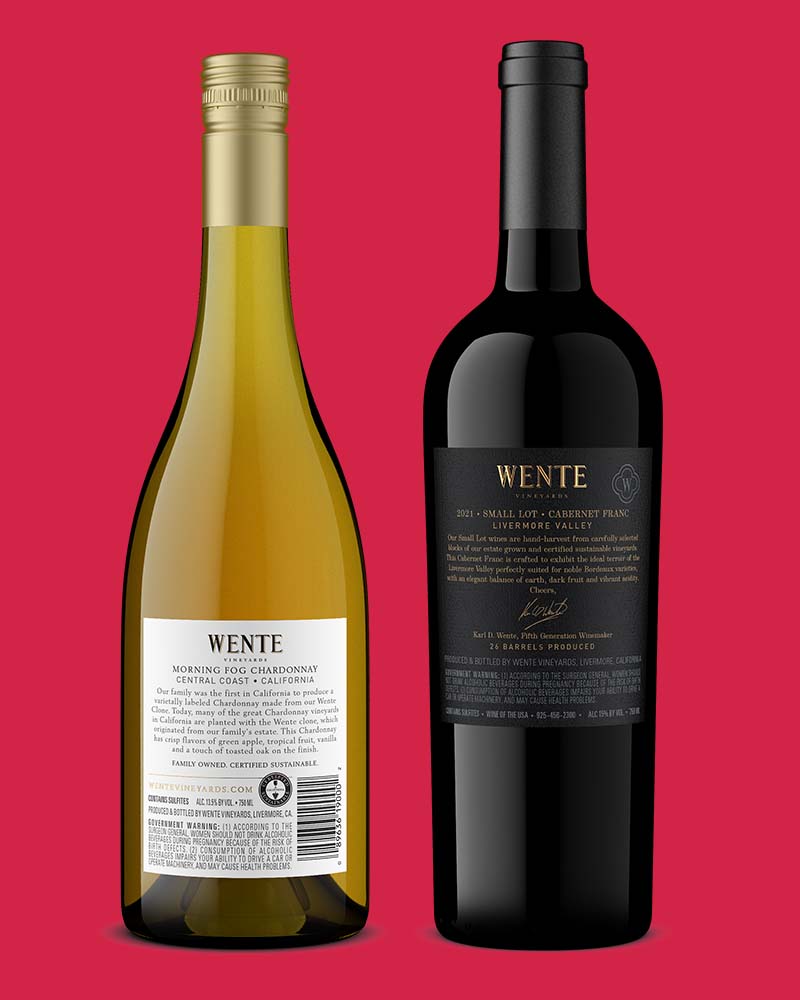 back product shots of wine bottles on red background