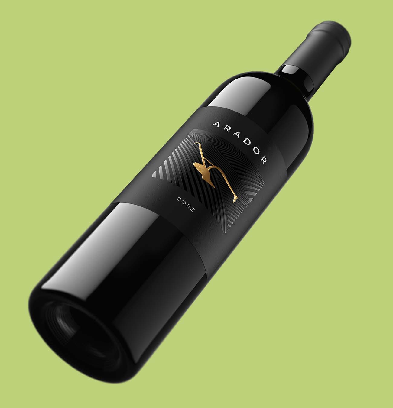 Arador 2022 red wine bottle shot on green background, featuring premium black label with gold bird emblem