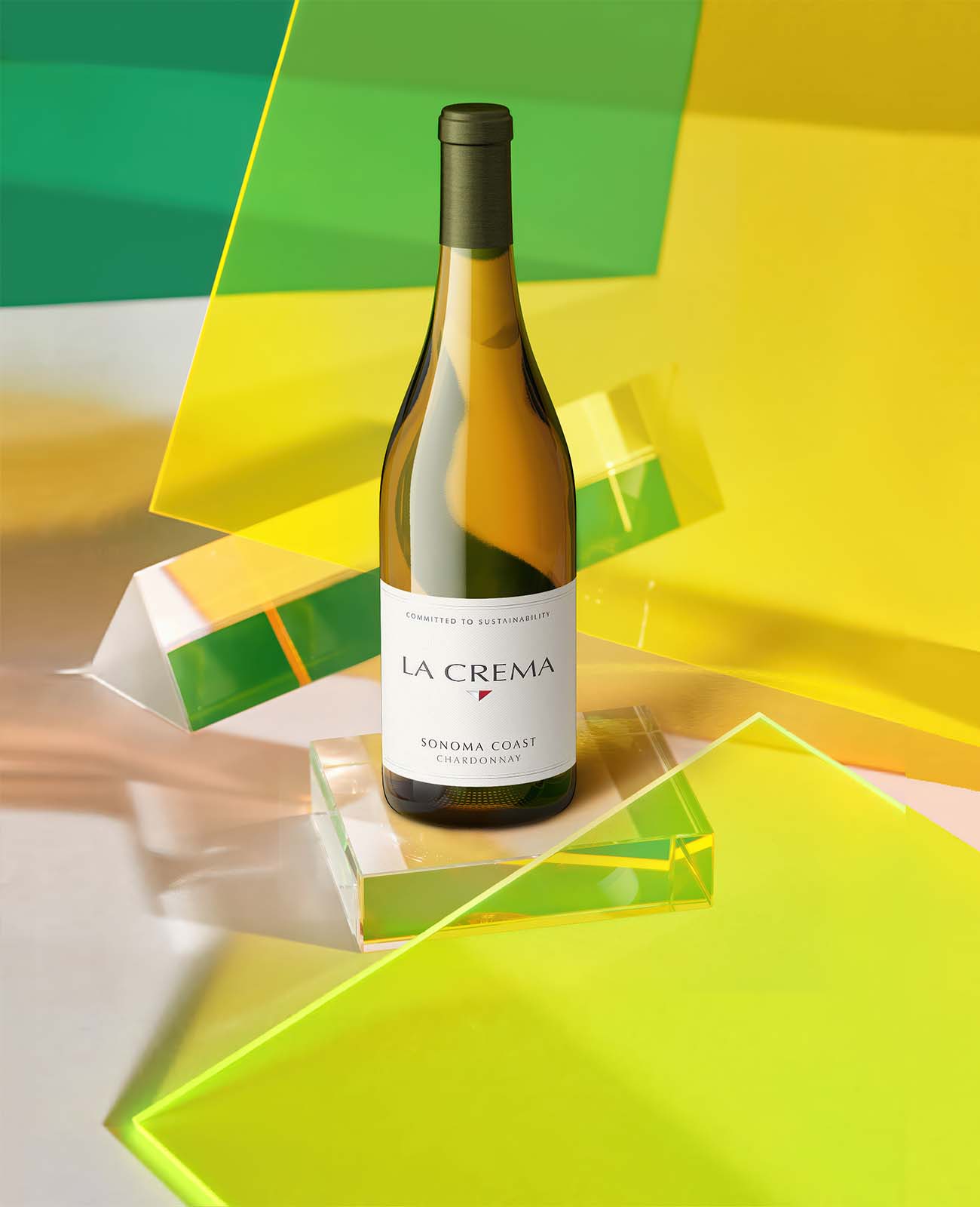 bottle of Sonoma Coast Chardonnay in a modern acrylic decor that is green and yellow