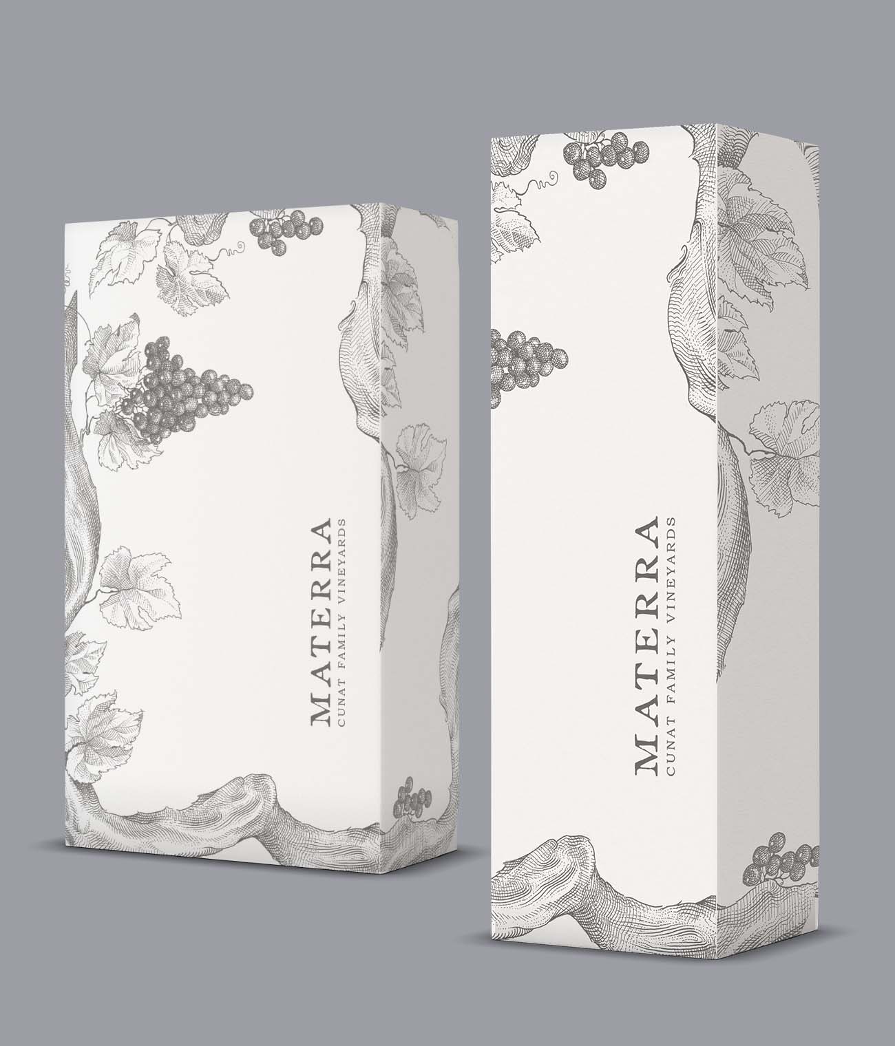 Two paper wine gift boxes on a neutral surface, featuring white backgrounds with botanical line-art borders.