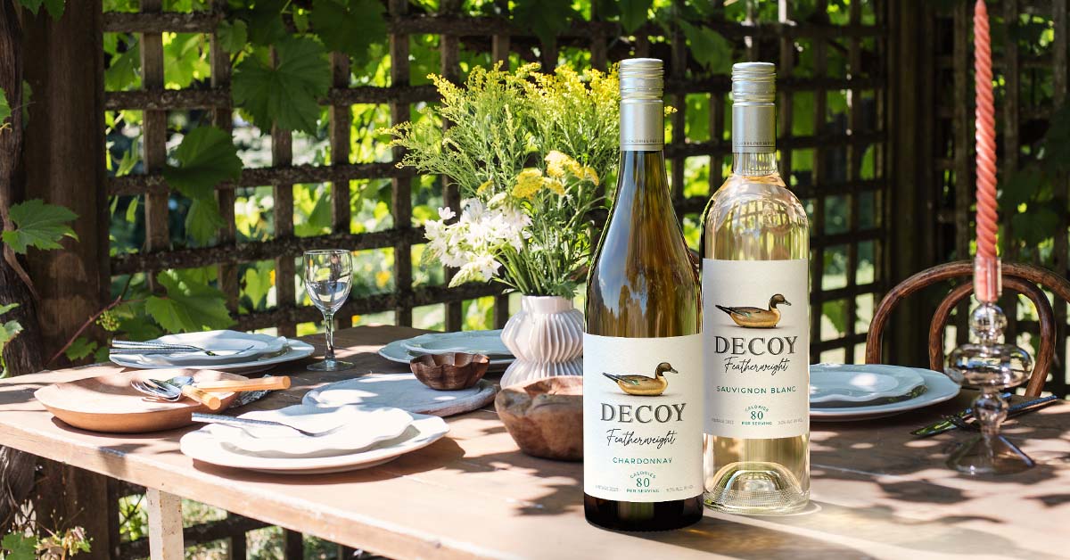 light alcohol low calories wine bottles in outdoor table under the shade, image by Outshinery