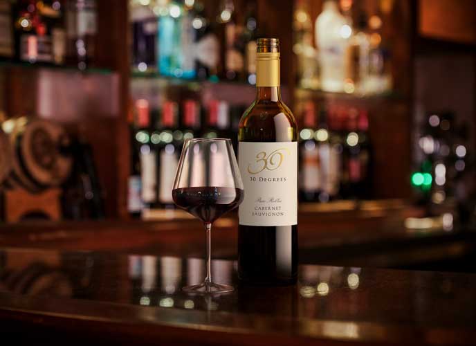 Wine bottle lifestyle image by Outshinery