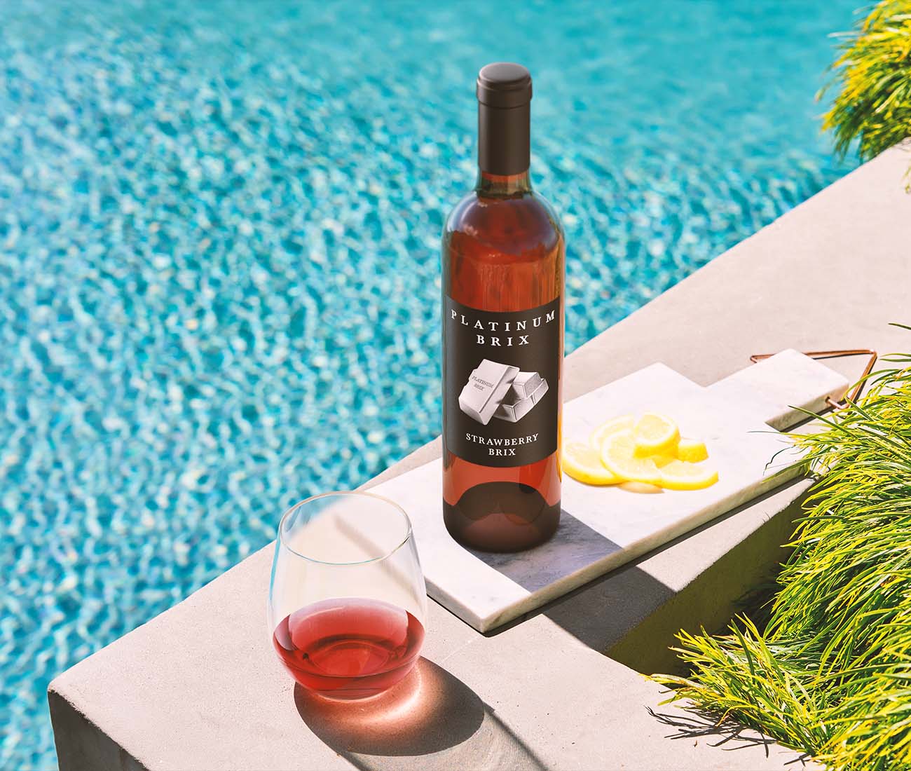 Platinum Brix Strawberry Brix wine bottle in a poolside lifestyle scene, photorealistic 3D wine bottle shot by Outshinery.