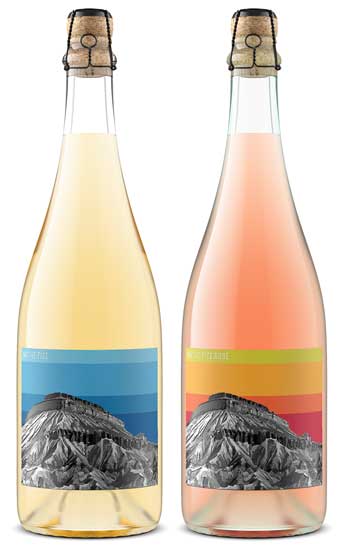 Native Fizz and Native Fizz Rosé sparkling bottle shot, clear glass with cork and cage and mesa sunset labels, by Outshinery