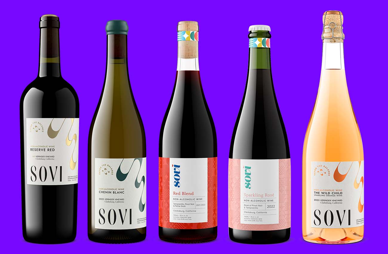 SOVI non-alcoholic wine lineup of five bottles with varied shapes and closures, rendered as a consistent set of bottle shots