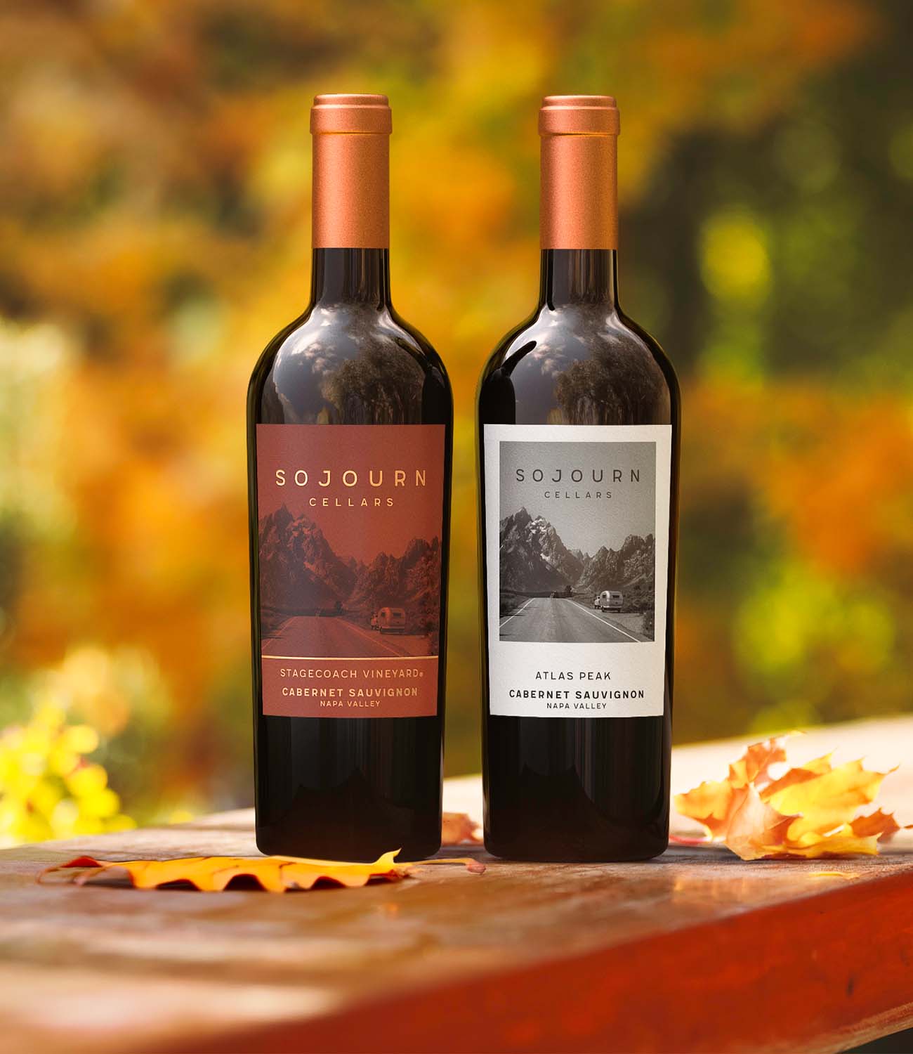Sojourn Cellars Stagecoach Vineyard and Atlas Peak Cabernet Sauvignon bottles in an autumn scene, a lifestyle image Lite does not produce