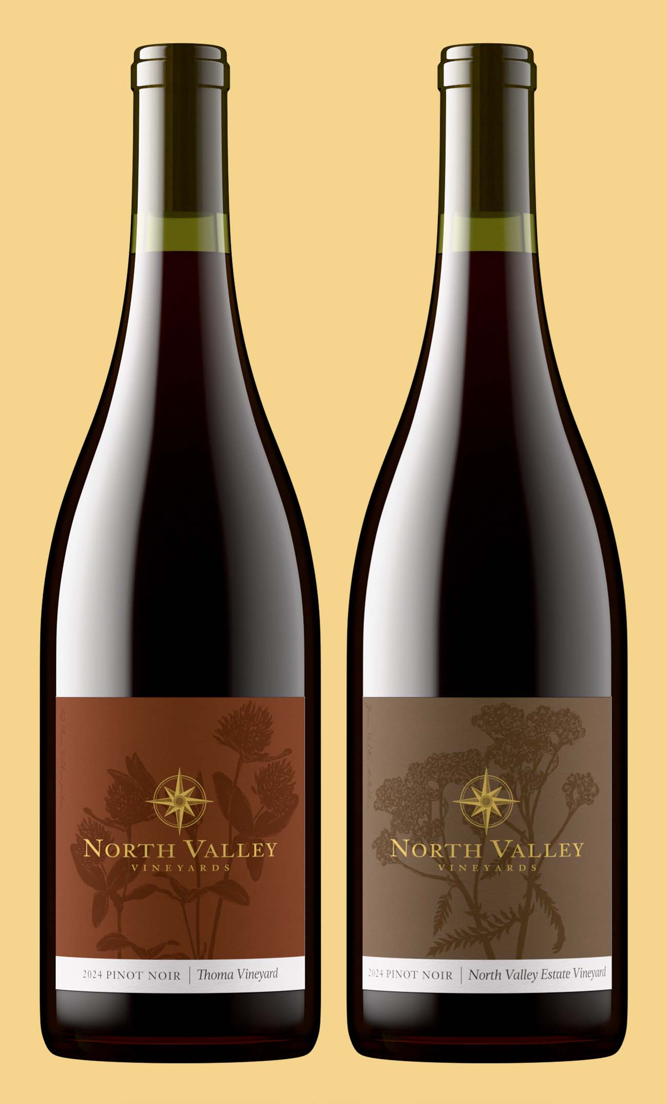 North Valley Vineyards 2024 Pinot Noir bottle shots from Thoma Vineyard and the estate vineyard, two flat-printed labels on the same Burgundy bottle