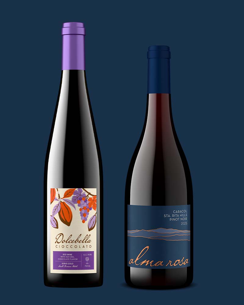 Two photorealistic Outshinery bottle shots on a navy background, Dolcebella Cioccolato with an illustrated grape and chocolate leaf label and Alma Rosa Caracol Pinot Noir with a minimalist label