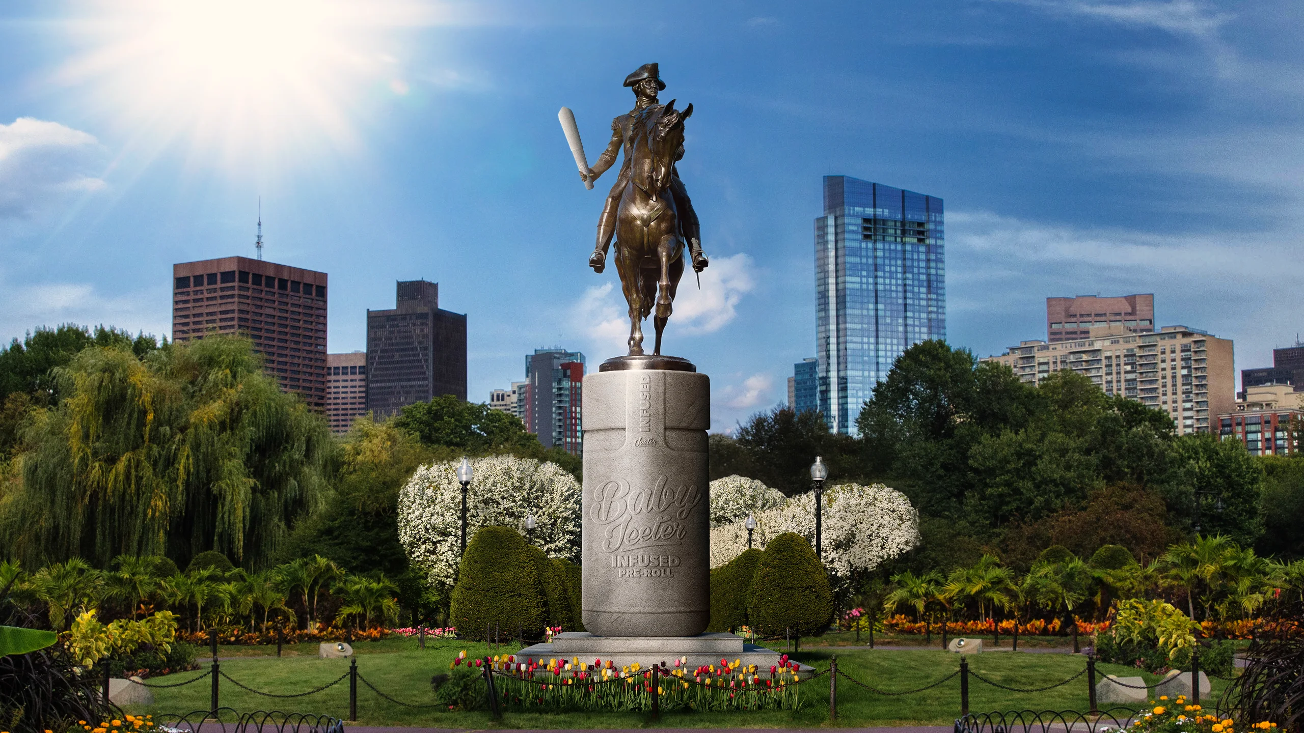 George Washington statue in the Boston Public Garden with the Boston skyline