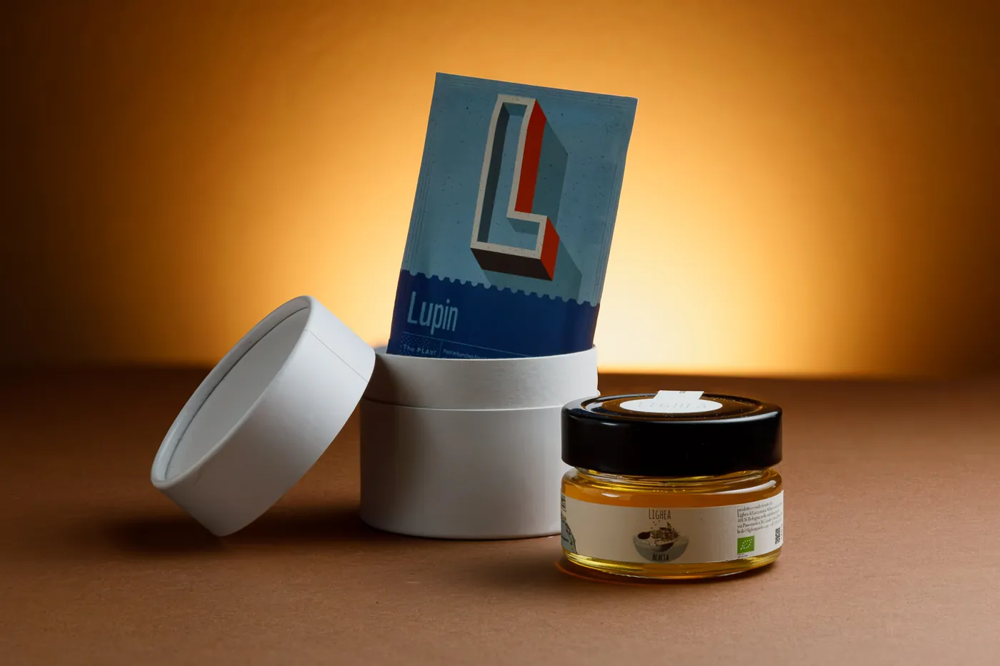 A chocolate packaging labeled 'Love Bites' with a cartoon-like orange character and the phrase 'Not a cookie' printed on it. The box has a rectangular shape and a dark brown color.