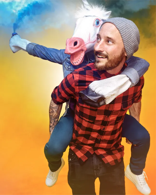 portrait of tim with unicorn on his back
