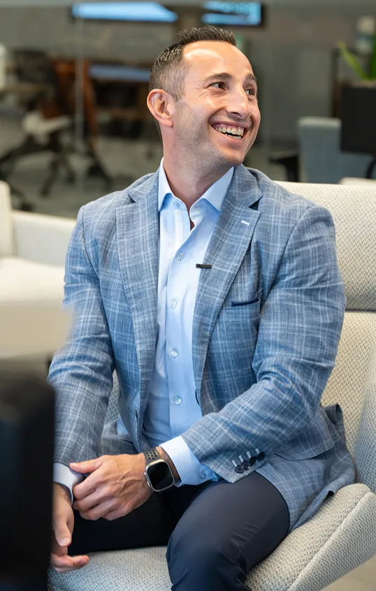 Candid photo of Brandon Bornancin during an interview.