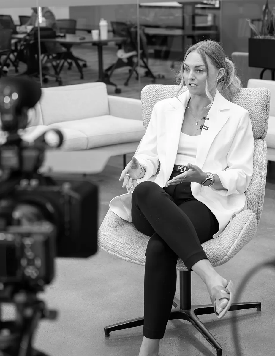 Candid photo of a Seamless employee during an interview.