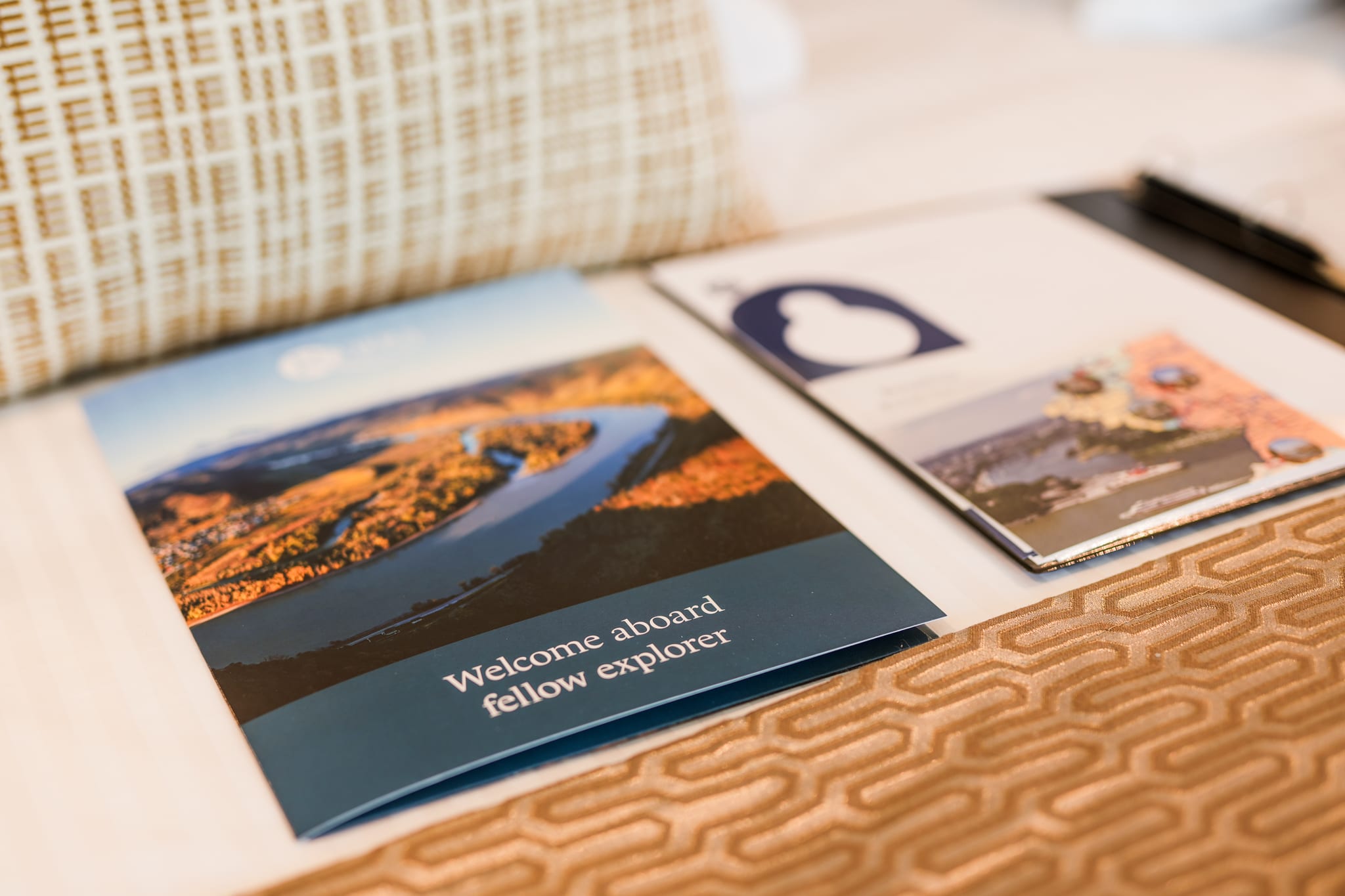 Welcome materials arranged inside a cabin aboard MS Riviera Resplendence