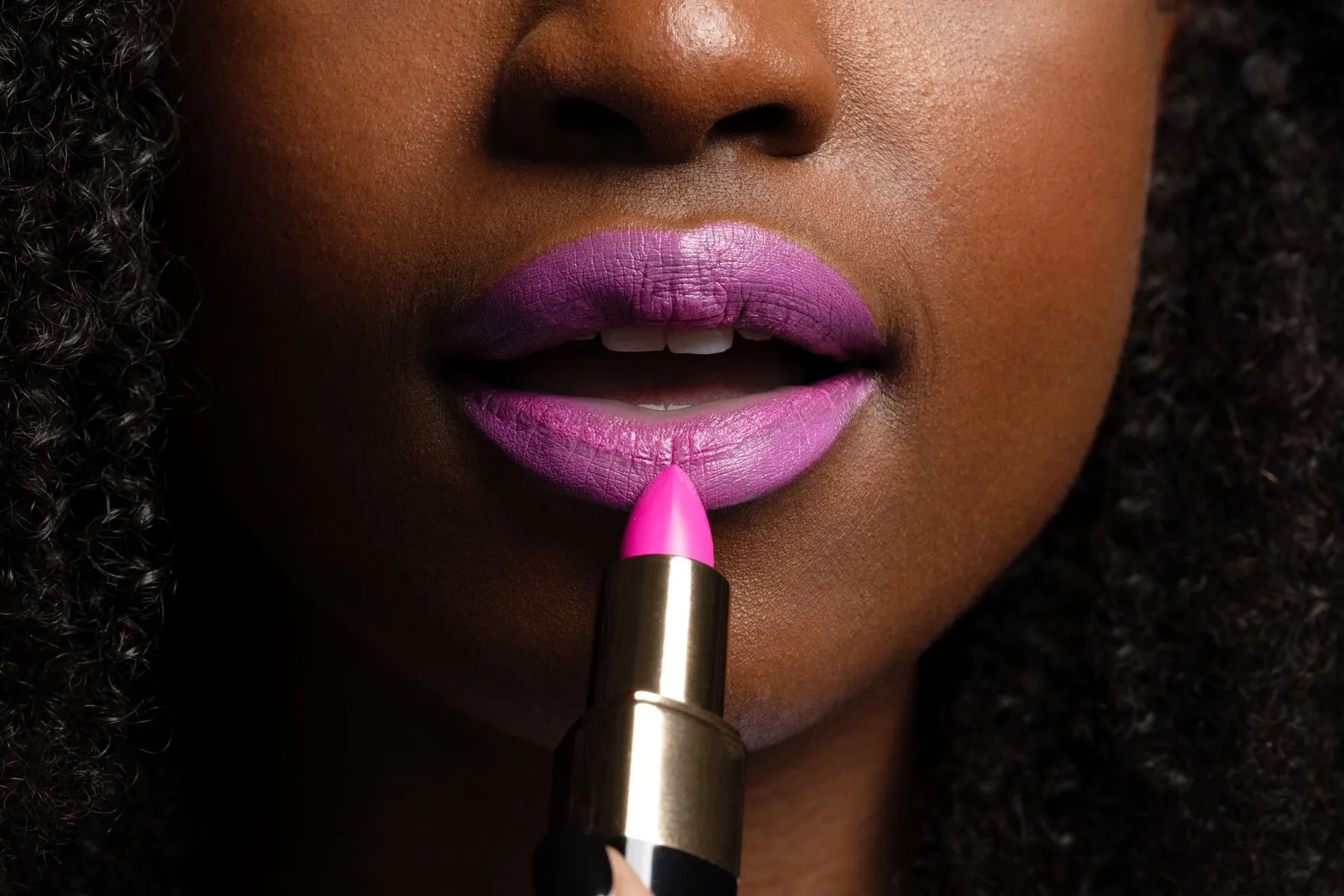 a glass of plant milk on a red background