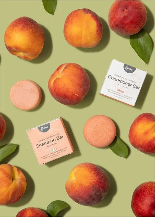 The Earthling Co. shampoo and conditioner bars with peaches
