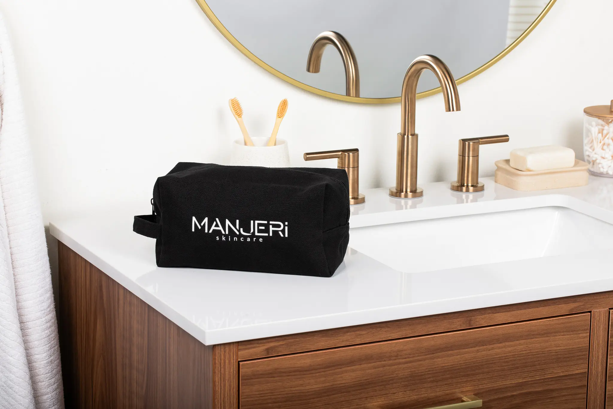 beauty bag on a vanity top in a bathroom