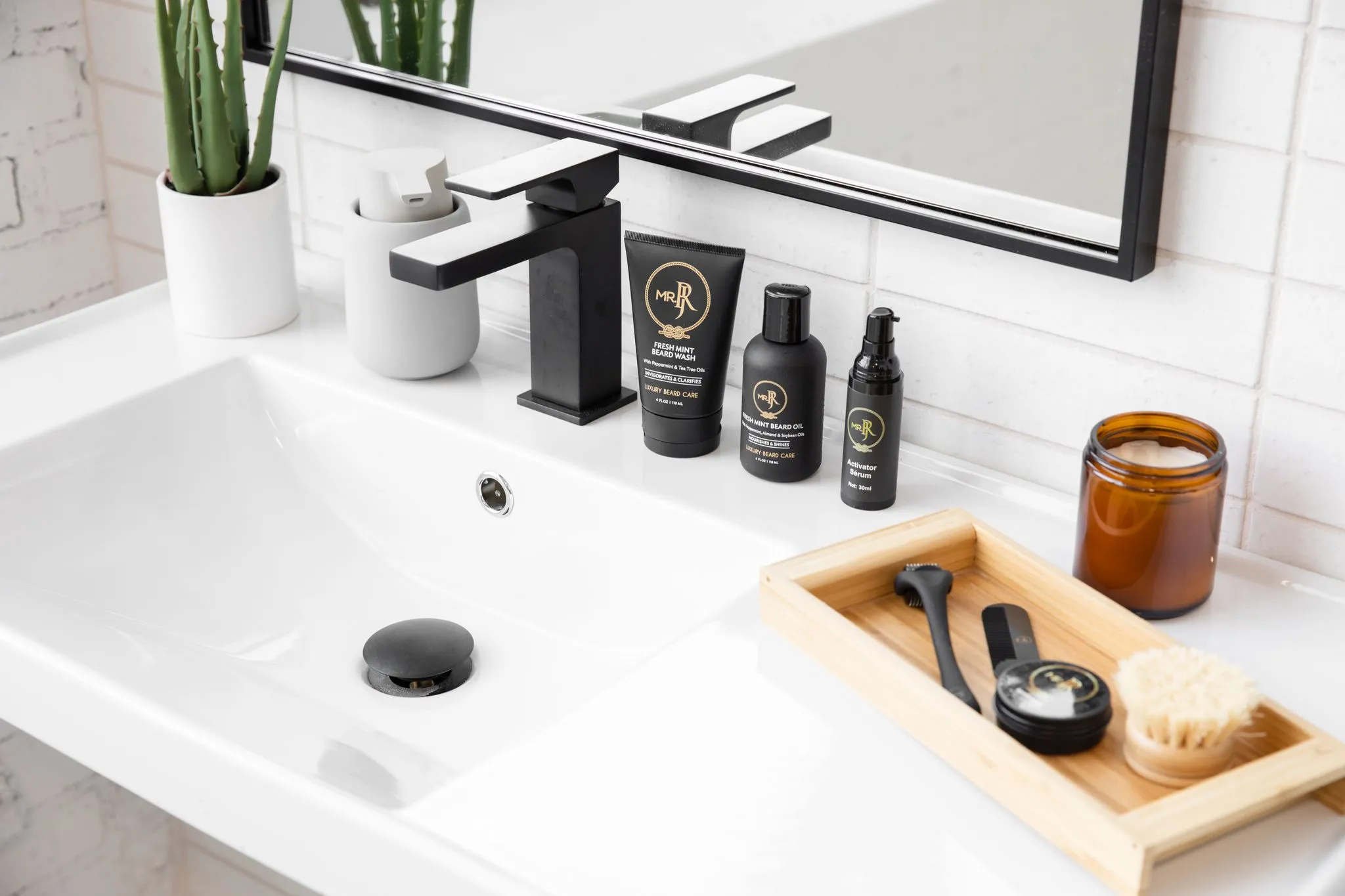 beauty products on a white modern sink.