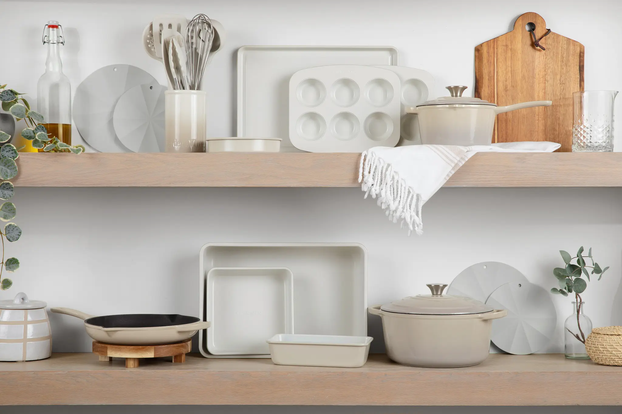 bakeware on shelves in kitchen