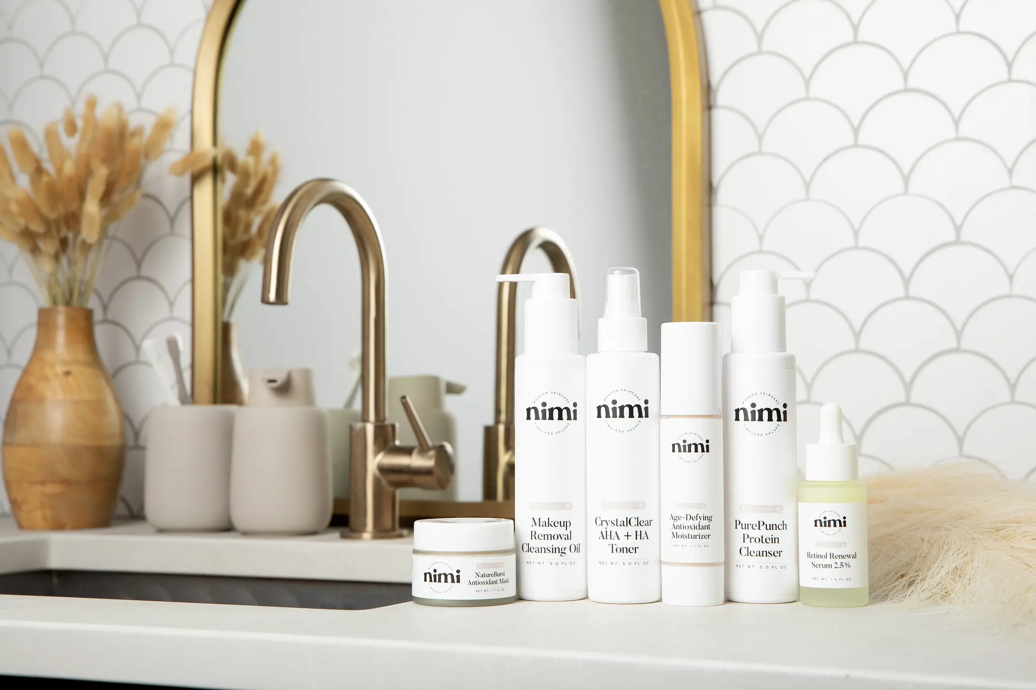 skincare products on bathroom vanity countertop