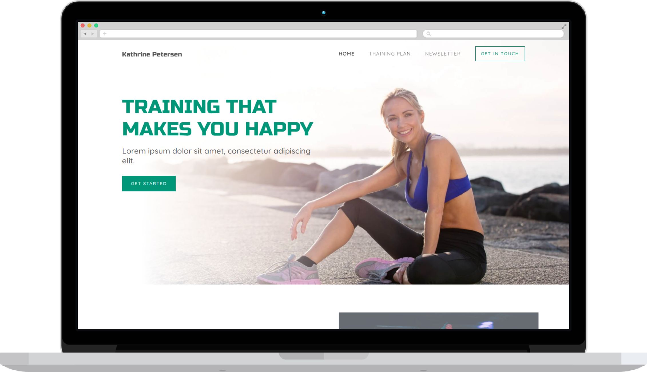 Personal fitness coach website shown on a laptop