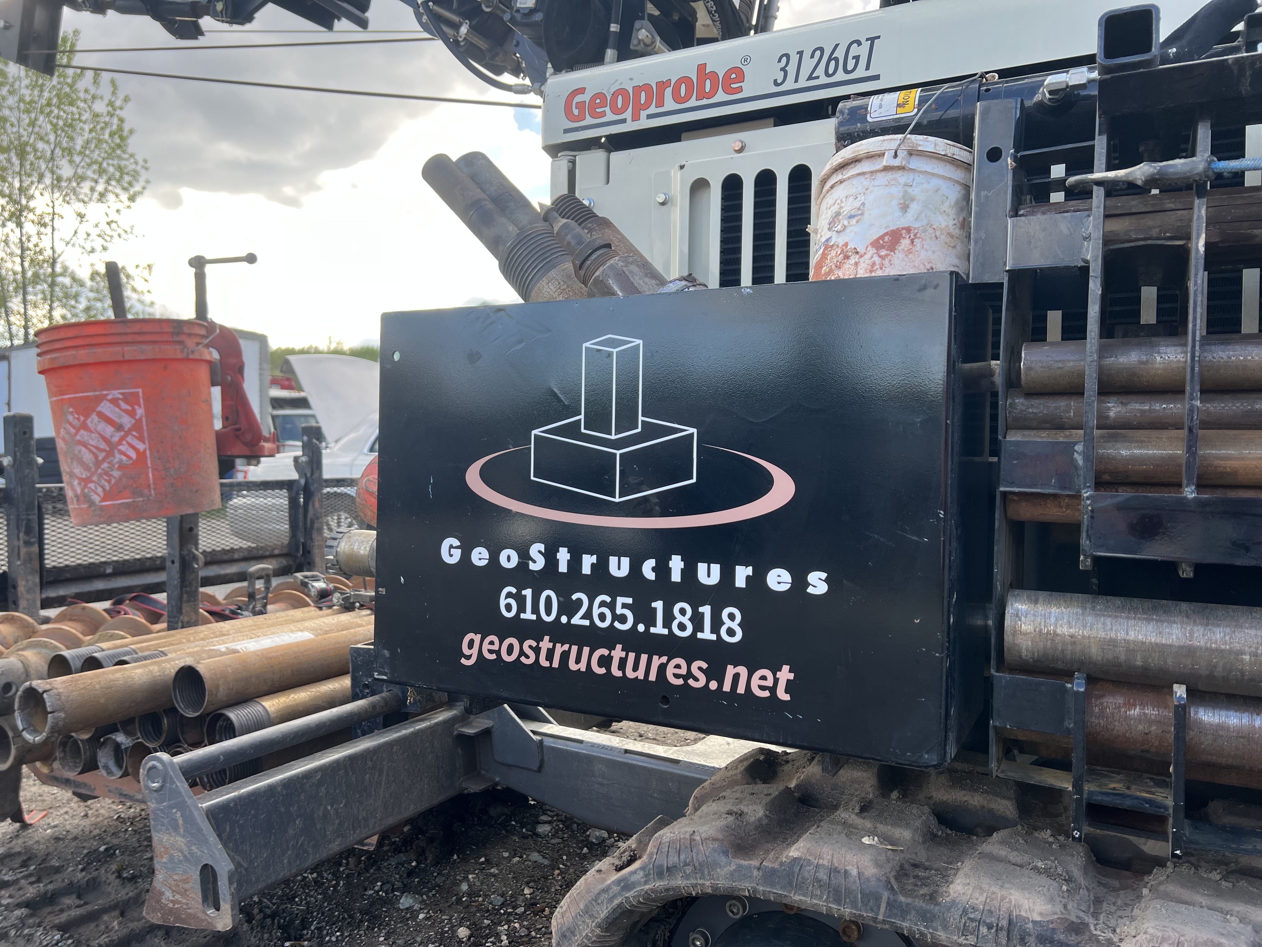 Branded equipment panel sign for GeoStructures mounted on a drilling rig