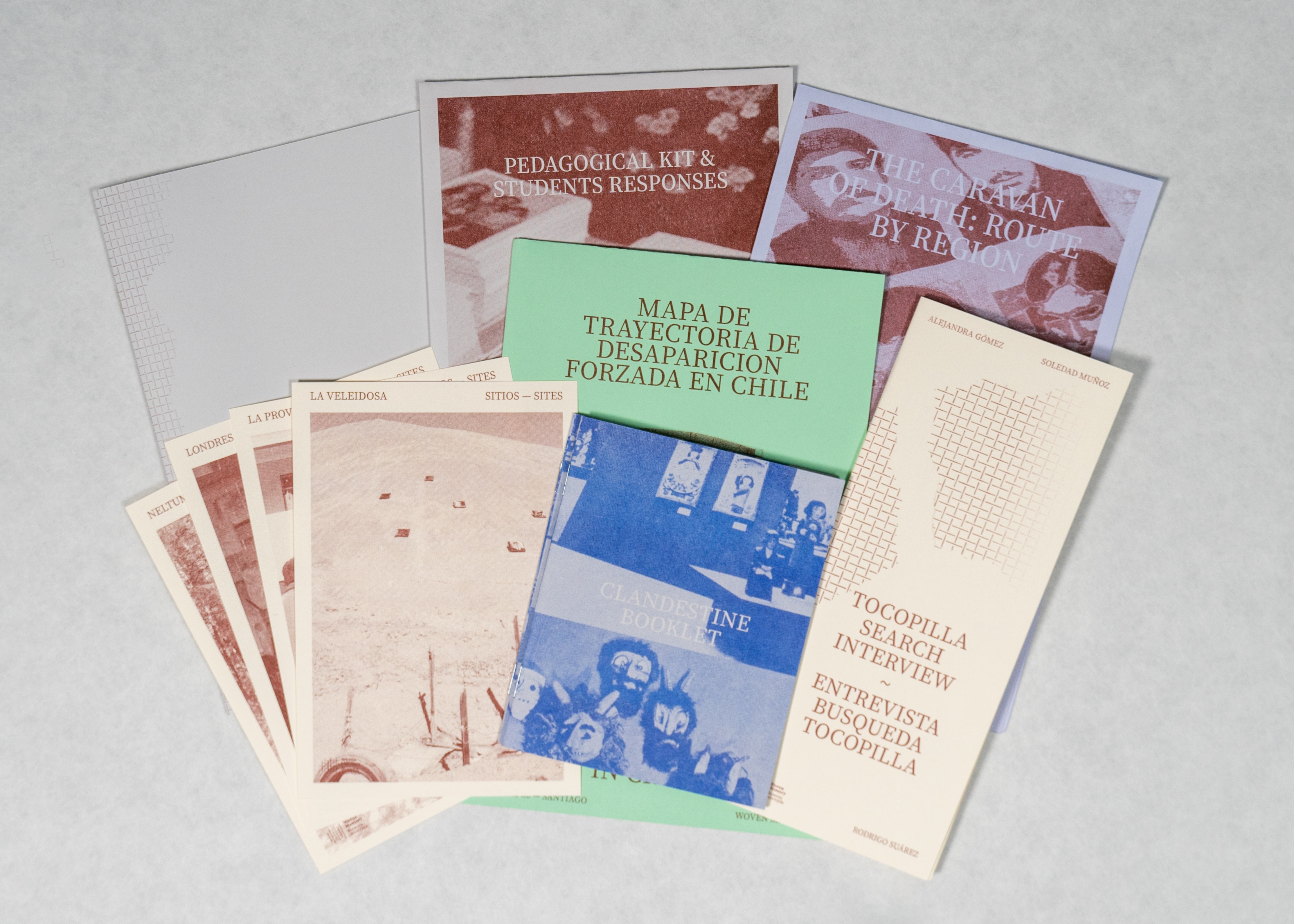 A collection of maps, images and booklets on a white background. 