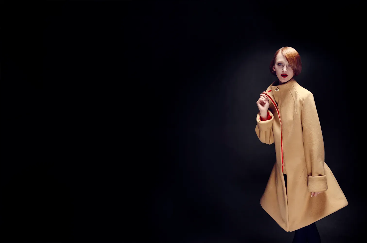 Timothy George Woman posing with a creme blazer photoshoot by Edmond Huot