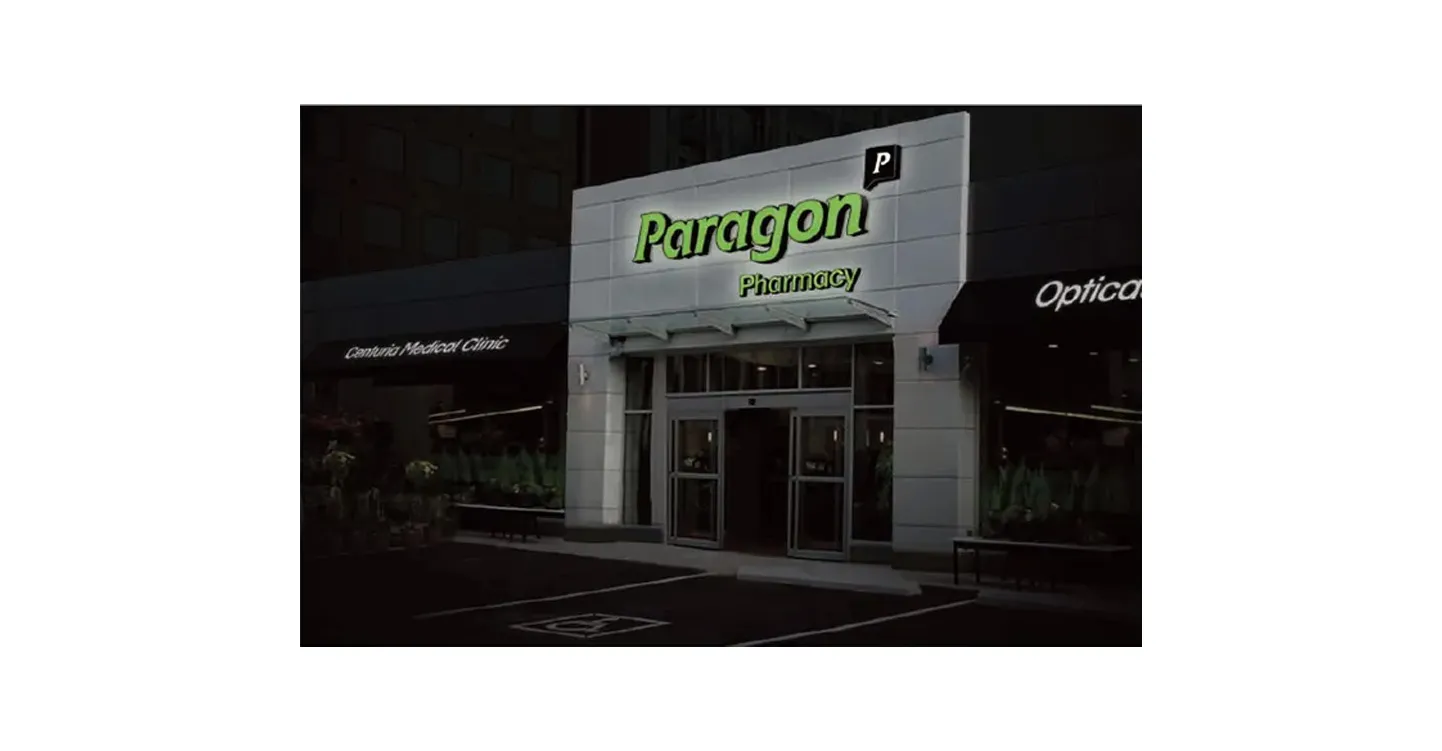 Paragon Pharmacy Night Exterior Frontal entrance of location render design by Edmond Huot