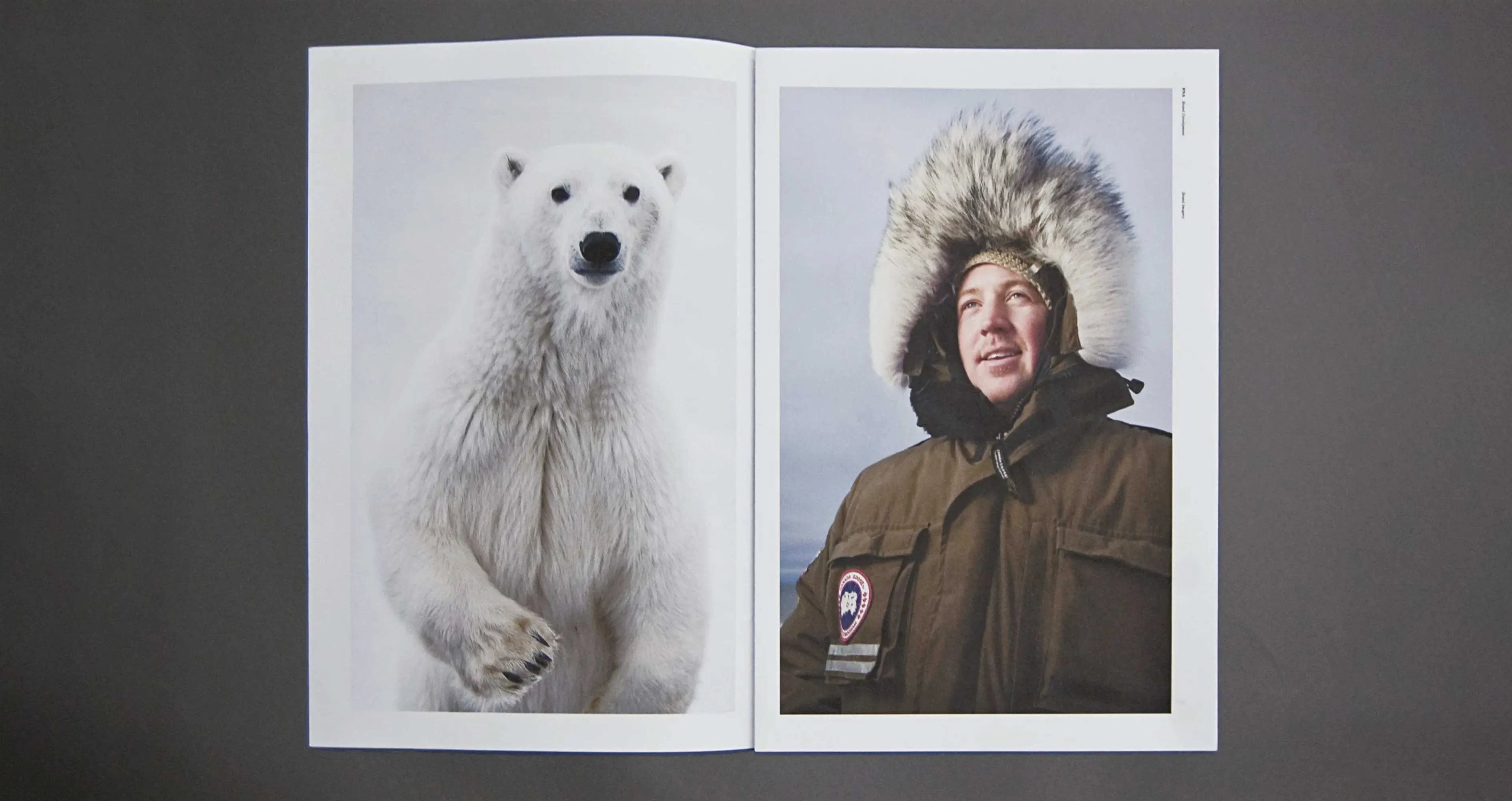 Frontiers North Adventures broadsheet spread of polar bear and men with a windbreaker design by Edmond Huot
