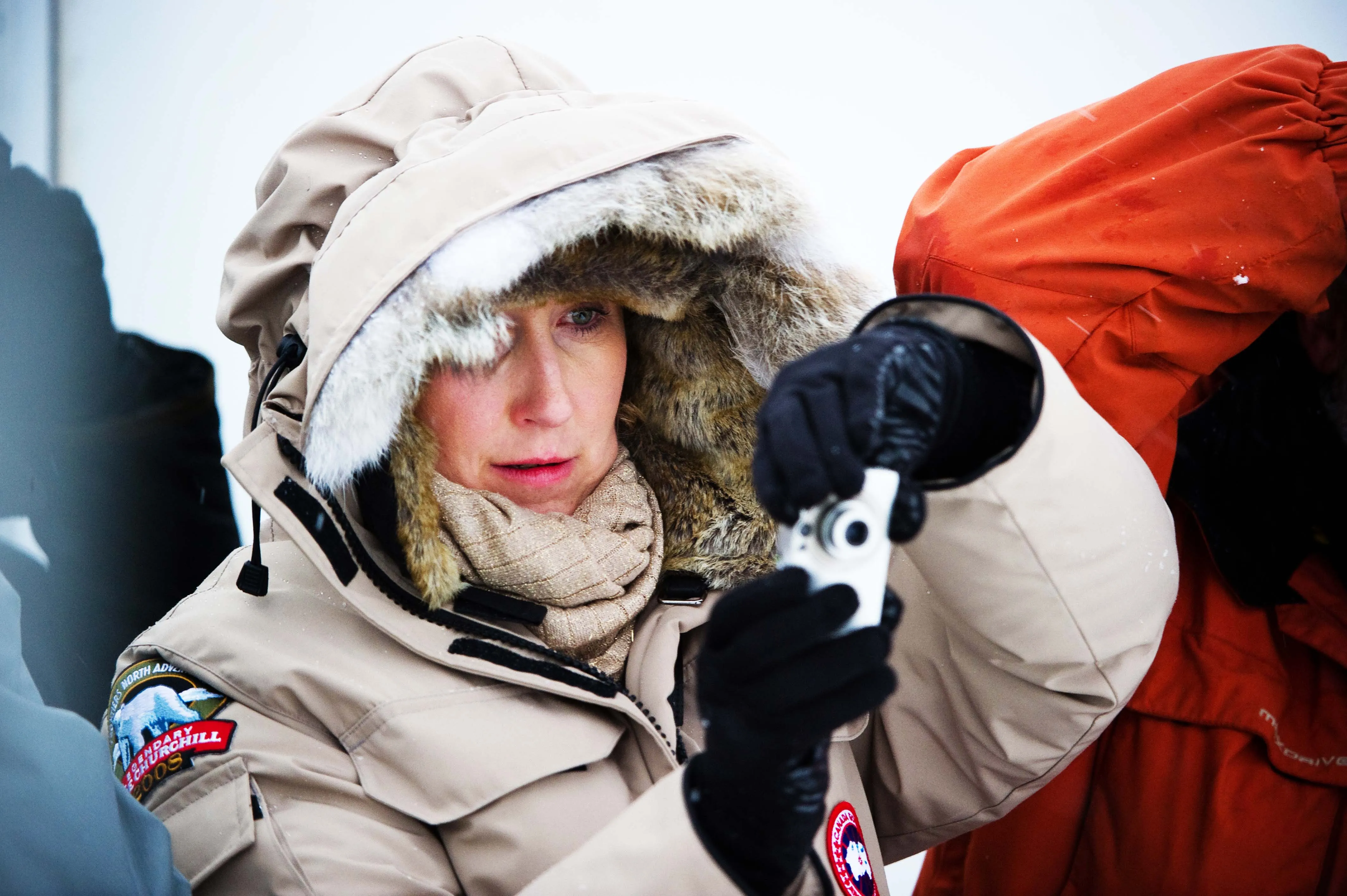 image of Woman holding a camera directed by Edmond Huot
